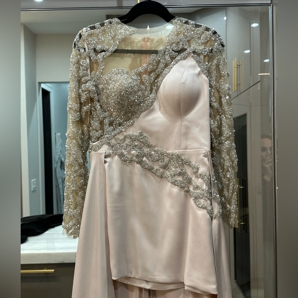 custom-made dress by Tabja from Kosovo the idea was taking Tony Ward Couture - Picture 1 of 11